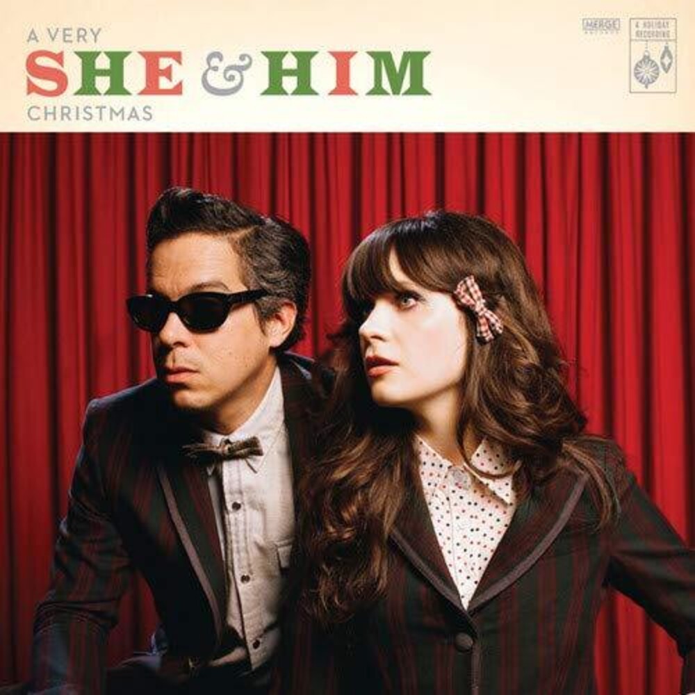 the album cover for She & Him - A Very She and Him Christmas